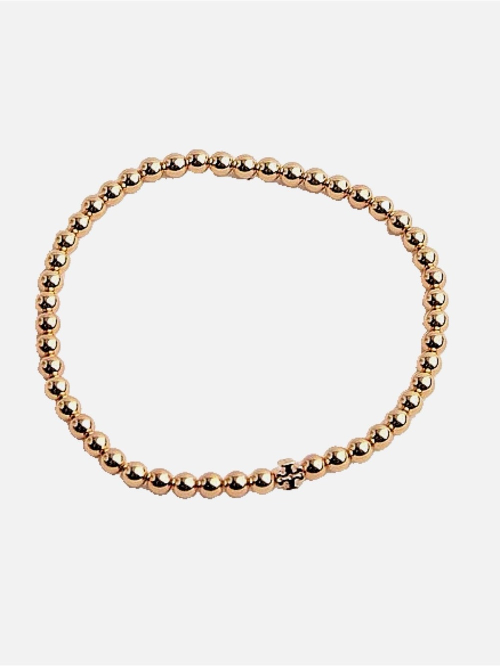 Beautiful TORY BURCH gold beaded stretch bracelet featuring iconic double T logo